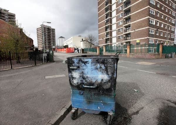 The scene in the New Lodge area of north Belfast where there was trouble on Saturday night. Police were attacked by a group of youths and bins were set alight