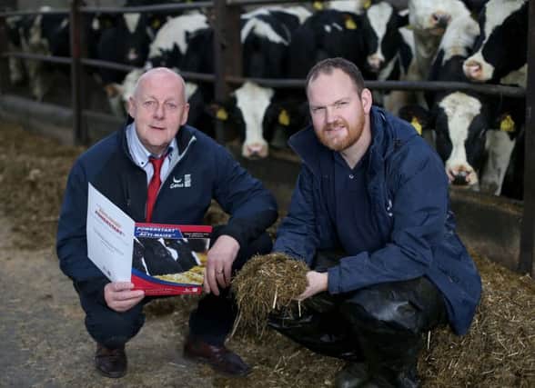 David Millar, right, who farms at Castlecat Road, Ballymoney chats to John Sayers, Genus ABS about his success with Powerstart silage additive which he has been using for many years. Picture: Steven McAuley
