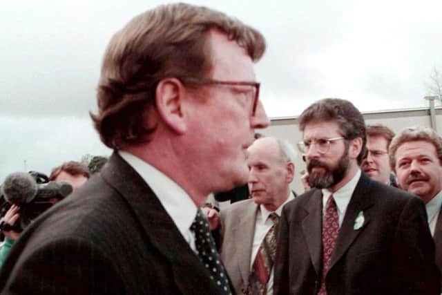 Ulster Unionist Party leader David Trimble and Sinn Fein President Gerry Adams pass outside Castle Buildings, Stormont during a break in the negotiations before the signing of the Belfast Agreement in 1998. 
Lord Trimble recalls: The SDLP were then the majority party within nationalism. If we obtained their agreement, we could then do a deal which Sinn Fein would have to accept. This is why there was no need for me to ever actually to talk to them