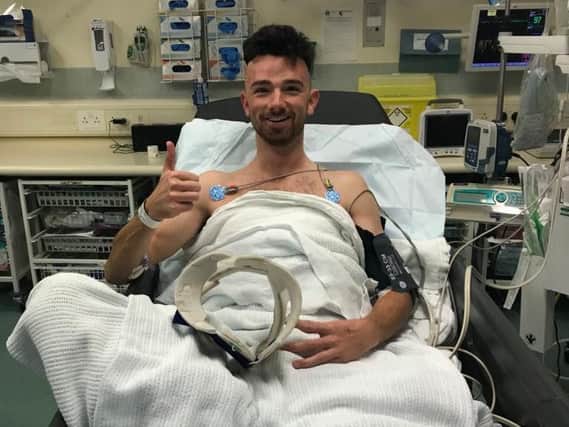 Glenn Irwin hopes to pass a fitness test to continue racing at Donington Park following a crash in opening practice on Saturday.