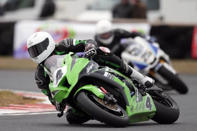 Gerard Kinghan (Kawasaki) leads Charles Stuart (Yamaha) in the second Ulster Superbike race at Bishopscourt on Saturday.