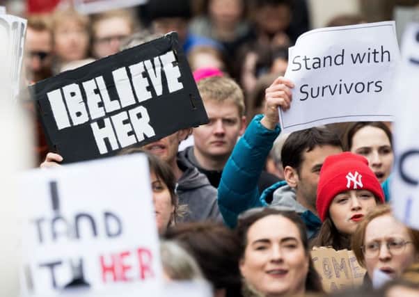 People take part in a protest in Dublin on Saturday, in support of the woman at the centre of a rape trial after two Ireland ruby players were acquitted. Photo: Tom Honan/PA Wire