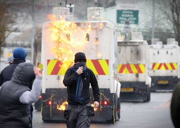 Police were attacked with petrol bombs and projectiles at an illegal dissident republican march in Londonderry. Picture Press Eye