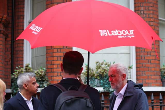 Labour leader Jeremy Corbyn (right) and the Mayor of London Sadiq Khan (left) canvassing in Chelsea, London ahead of the local elections.