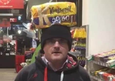 Former Sinn Fein MP Barry McElduff pictured with a loaf of Kingsmill bread on his head.