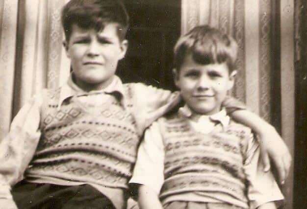 John Larmour with his younger brother George. John becamse an RUC man who was shot dead by the IRA in 1988