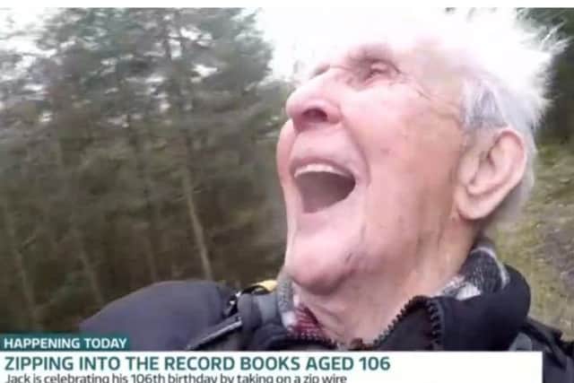 Jack Reynolds riding a zip wire on his 106th birthday, earning him his third Guinness World Record by becoming the oldest person. Pic: ITV