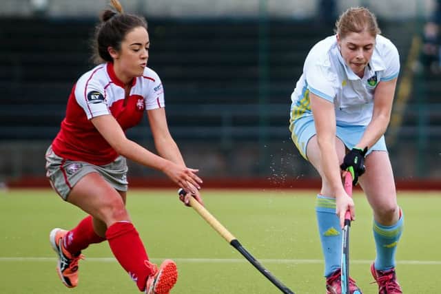 UCD's Katie Mullan and Katie McKee of Pegasus
in action in the Irish Senior Cup final.