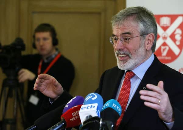 Comments about violence by Gerry Adams, seen above at Queens University on Tuesday on the 20th anniversary of the Belfast Agreement, were surprisingly honest.   Photo: Brian Lawless/PA Wire