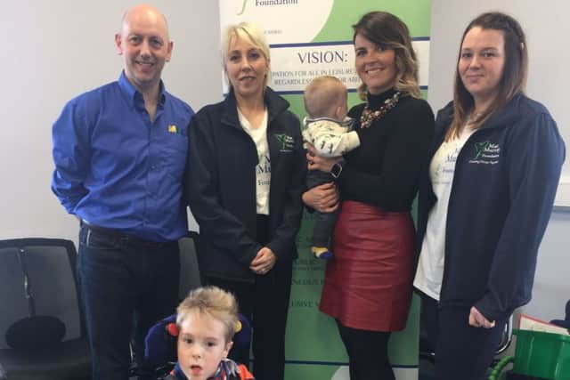 Larne business AM Nexday helped to fund the cost of the clinic to fit Bugzis.. From left: Graham from Meru, Alix Crawford Chairperson of MMF, Sarah Hards from AM Nexday and Kyleigh Lough MMF.