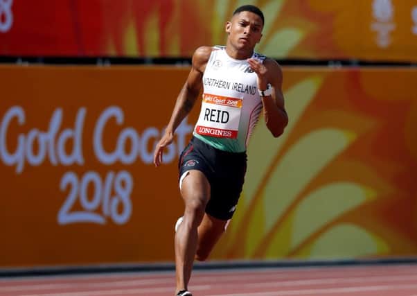 Northern Ireland's Leon Reid in action during the Men's 200m Round One heats at the Carrara Stadium during day six of the 2018 Commonwealth Games in the Gold Coast, Australia. PRESS ASSOCIATION Photo. Picture date: Tuesday April 10, 2018. See PA story COMMONWEALTH Athletics. Photo credit should read: Martin Rickett/PA Wire. RESTRICTIONS: Editorial use only. No commercial use. No video emulation.