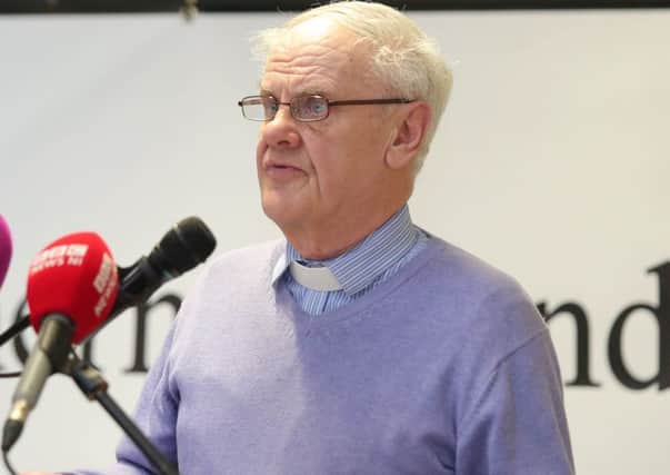 Former Presbyterian moderator Rev Norman Hamilton addressing the press conference where loyalist paramilitaries vowed to end criminality