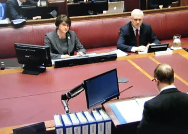 Arlene Foster answers questions yesterday in Stormonts senate chamber from David Scoffield QC, whose back is to the camera
