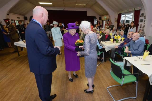 Queen Elizabeth II during a visit to the King George VI Day Centre, Windsor, to mark the 60th anniversary of its opening and the 70th anniversary of the Windsor Old People's Welfare Association