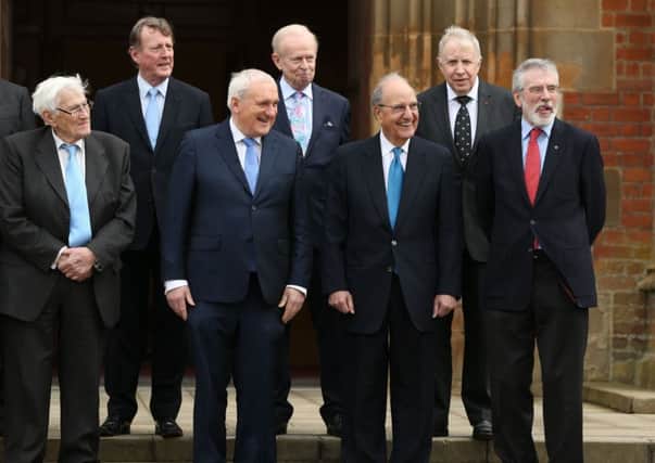 (back row left to right) Lord David Trimble, Sir Reg Empey, Lord Paul Murphy of Torfaen and (front row left to right) Seamus Mallon, former taoiseach Bertie Ahern, Senator George Mitchell and Gerry Adams, at an event to mark the 20th anniversary of the Good Friday Agreement, at Queen's University in Belfast on  April 10