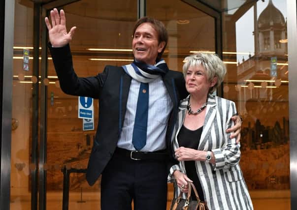 Sir Cliff Richard leaves the Rolls Building in London with Gloria Hunniford, where he gave evidence in a legal battle against the BBC. The 77-year-old singer has sued the BBC over coverage of a police raid at his apartment in Sunningdale, Berkshire, in August 2014 following an allegation of sexual assault. Photo: Dominic Lipinski/PA Wire