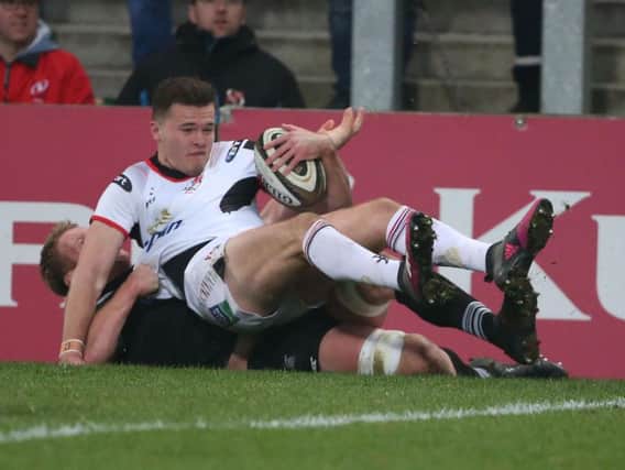 Jacob Stockdale comes up short from the try line against Ospreys