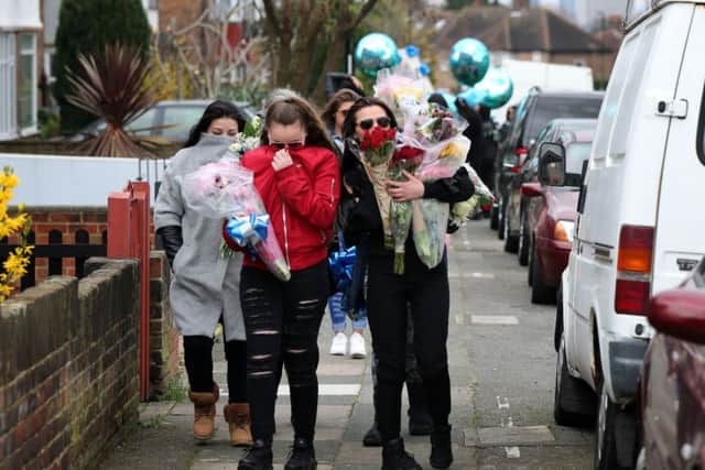 Friends and relatives of Henry Vincent bring birthday tributes at the scene on South Park Crescent in Hither Green, London, following last week's incident where Vincent was fatally stabbed in botched burglary at the home of Mr Osborn-Brooks. Picture: Gareth Fuller/PA Wire