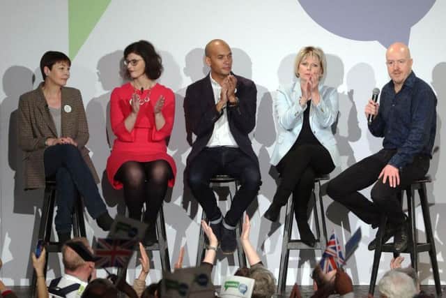 Politicians Caroline Lucas, left, Layla Moran, Chuka Umunna, and Anna Soubry are joined onstage by comedian Andy Parsons, right, during the People's Vote campaign launch on Brexit at the Electric Ballroom in Camden Town