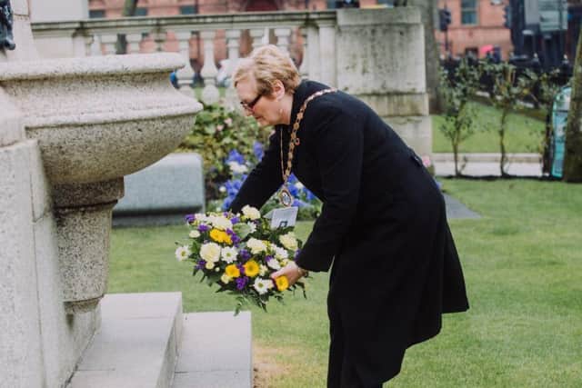 Belfast City Council handout photo of Deputy Lord Mayor, Councillor Sonia Copeland lays a wreath at the Titanic Memorial to remember more than 1,500 people who perished during the sinking of the RMS Titanic in 1912 during the Titanic Memorial Service in the grounds of Belfast City Hall