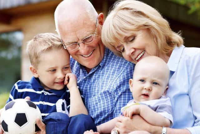 Happy grandparents and grandchildren - Outdoors