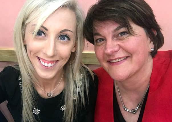 The photograph of Carla Lockhart (left) and Arlene Foster that triggered online abuse