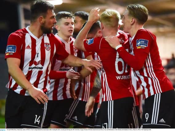 Rory Patterson, centre, of Derry City is congratulated by team-mates after scoring his side's second goal during the SSE Airtricity League Premier Division match between Derry City and Bohemians at the Brandywell Stadium