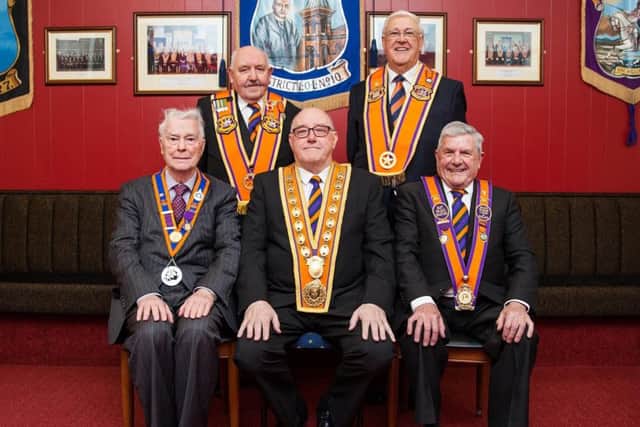Spencer Beattie, grand master of the County Grand Orange Lodge of Belfast (seated, centre) at the recent installation dinner with past Belfast grand masters (from left) Rev Martin Smyth, George Chittick, Tom Haire and Robert Saulters