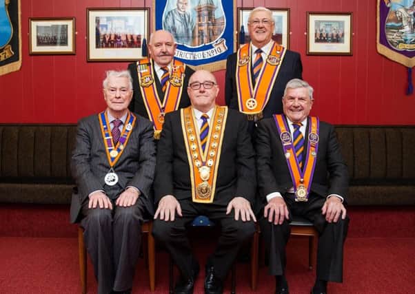 Spencer Beattie, grand master of the County Grand Orange Lodge of Belfast (seated, centre) at the recent installation dinner with past Belfast grand masters (from left) Rev Martin Smyth, George Chittick, Tom Haire and Robert Saulters