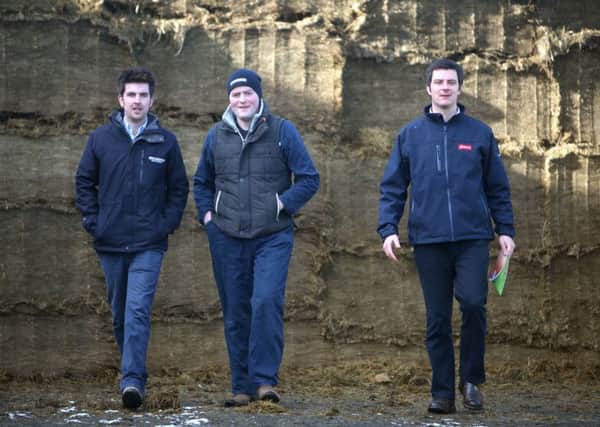"We made the best silage ever last year using Ecosyl," reports Dervock dairy farmer Jonathan McAlister, centre, see here with David Anderson of Thompsons and, right, Volac Forage Specialist Noel McGrath.