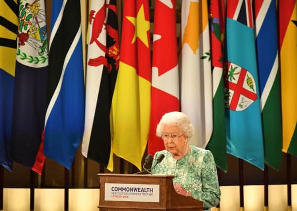 Queen Elizabeth II speaks at the formal opening of the Commonwealth Heads of Government Meeting in the ballroom at Buckingham Palace in London. PRESS ASSOCIATION Photo. Picture date: Thursday April 19, 2018