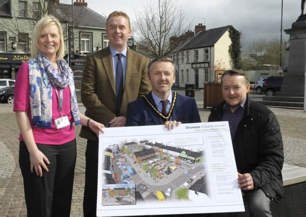 Deputy Lord Mayor, Councillor Sam Nicholson welcomes Chris McNabb from GM Designs to the Dromore Town Centre public realm scheme along with Lissa OMalley, Regeneration Officer and Nigel McIlrath, Corporate Project Officer from Armagh City, Banbridge and Craigavon Borough Council. Pic by Edward Byrne Photography