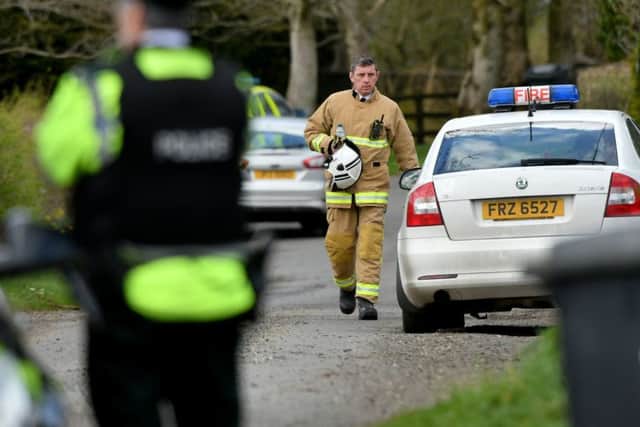 Emergency services personnel pictured at the scene of the crash