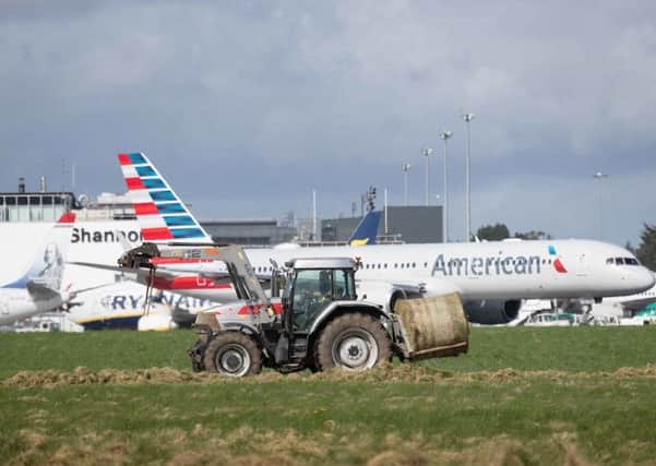 Local farmers cutting sileage at Shannon Airport's 400 acres today to alleviate the fodder crisis. Photograph by Eamon Ward (Further information available from Eugene Hogan Email: eugene.hogan@bridgepr.ie
Tel: Mob +353 (0) 87 2497290 )
