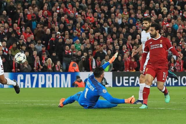 Liverpool's Mohamed Salah scores his side's second goal against Roma