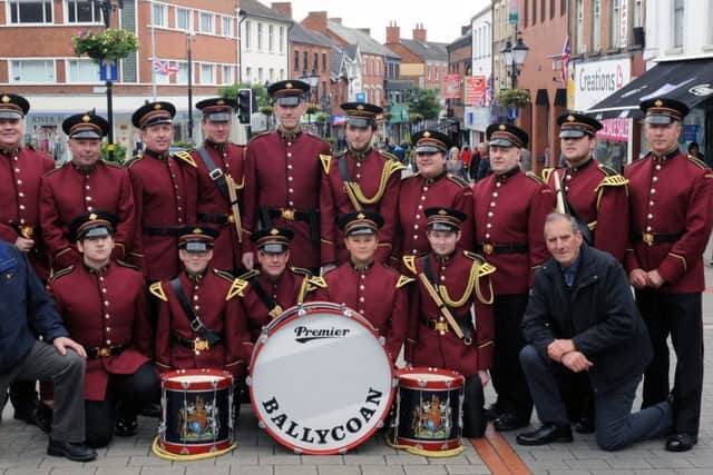 John Moore (front row, right) and Ballycoan Flute Band pictured after the band entertained city centre shoppers in Lisburn in June 2012. Pic by John Kelly