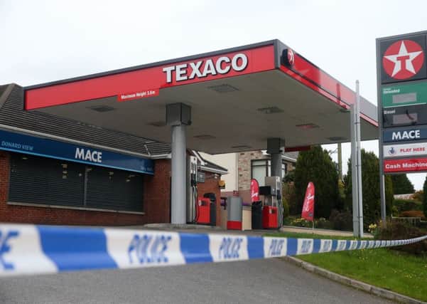A cash machine containing a substantial amount of money has been stolen from a shop in Ballynahinch, Co Down
