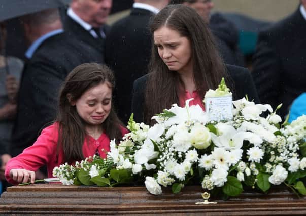 The funeral of Lisa Gow at St Andrews Church in Glencairn in North Belfast on Tuesday.
The mother-of-two died after being struck by a stolen vehicle on Thursday morning on Belfast's Ballysillan Road.


Pic Pacemaker