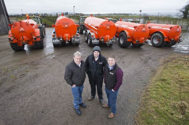 Agricultural contractor Robin McCann with his rnage of Abbey tankers