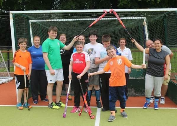 NI Civil Service Hockey Club is offering free coaching sessions for young people with disabilities