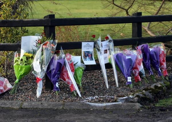 Flowers laid at the spot where teenagers Debbie Whyte and Nathan Gault were struck by a car in 2008