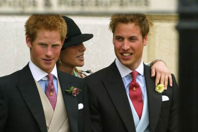 File photo dated 9/4/2005 of Prince Harry (left), Zara Phillips (centre) and Prince William after the mariage ceremony of Prince Charles and Camilla Parker Bowles at Windsor Guildhall. Prince Harry has asked his brother the Duke of Cambridge to be his best man at his wedding to Meghan Markle, Kensington Palace said.