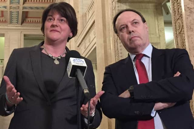 DUP leader Arlene Foster with deputy leader Nigel Dodds speaking at Parliament Buildings in Stormont, Belfast. Picture: David Young/PA Wire