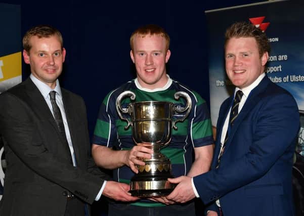 Winner of Ulster Young Farmer of the Year, sponsored by Dankse Bank is Timothy Savage, Annaclone and Magherally YFC. Timothy is pictured receiving the McCausland Trophy from Ian Dunlop, Danske Bank, and YFCU president James Speers