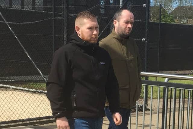 Sean Pearson (on the left) and a co-accused who is one of the six in the 'colour party' in the parade. (none of the six identified themselves in court)