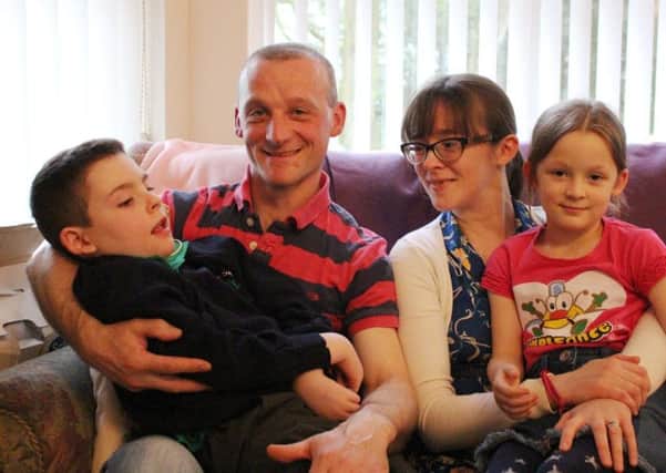 Graham and Joanne McFarland with son Andrew 8, and Faith 6, are raising funds for Northern Ireland ChildrenÂ’s Hospice which cares for Andrew at home and at hospice