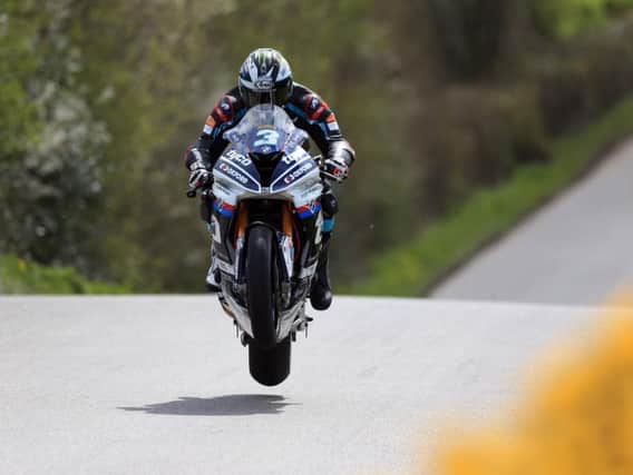 Michael Dunlop gets airborne on the Tyco BMW during practice at the Cookstown 100.
