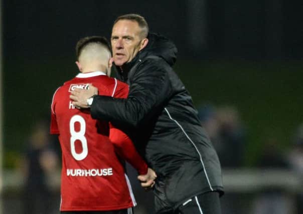 Derry City manager Kenny Shiels with Rory Hale after the SSE Airtricity League Premier Division match against Shamrock Rovers at Brandywell Stadium.