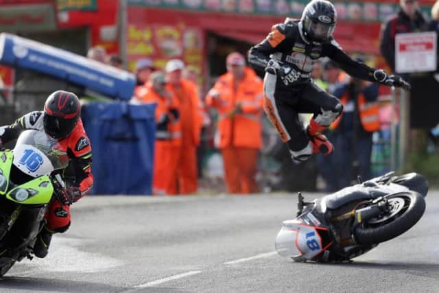 English rider Owen Graves crashed at Braeside corner in the Senior Support race.