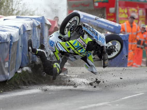 Ballyclare's Darren Keys came off his Suzuki at Braeside corner in the Senior Support race.